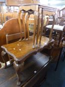 A WALNUT COFFEE TABLE, and a nest of three tables (2)