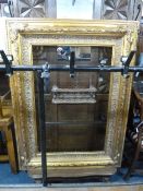 A LARGE MODERN GILT PICTURE FRAME, approximate size of internal recess 91.5xcm x 60.5cm
