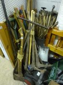 A QUANTITY OF GARDEN TOOLS, to include shovels, axes, etc