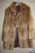 A 3/4 LENGTH FUR COAT