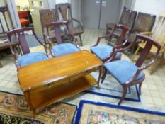 A SET OF FOUR ARMCHAIRS, with blue upholstery and a cherrywood coffee table (5)
