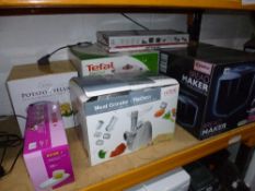SEVEN VARIOUS KITCHEN ACCESSORIES, to include two bread makers, potato peeler, meat grinder, etc