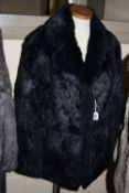 A 'BLUE' FUR JACKET, size 14