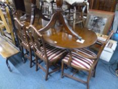 A MAHOGANY TWIN PEDESTAL DINING TABLE, with one extra leaf, approximate extended size length 229cm x