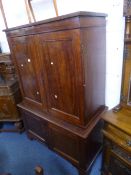 A MAHOGANY TWO DOOR LINEN PRESS, with lower cupboard, sd, repairs, alterations, approximate size