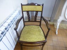 AN EDWARDIAN MAHOGANY INLAID ARMCHAIR