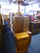 A PINE TWO DOOR CABINET, and a pine circular table (2)