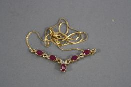 A 9CT RUBY AND DIAMOND NECKLACE