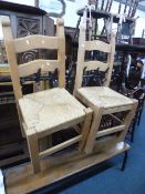 A PAIR OF MODERN RUSH SEATED KITCHEN CHAIRS