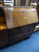AN EDWARDIAN MAHOGANY AND SATINWOOD CROSSBANDED WRITING BUREAU (sd) (key)