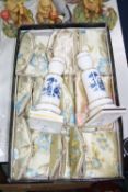 A QUANTITY OF MODERN SILK PURSES, and a pair of modern porcelain 'Aquatinta' pattern candlesticks
