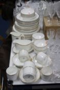 A ROYAL DOULTON PART DINNER SERVICE, white with gilt rims (over 45 pieces)