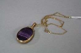 A LATE 20TH CENTURY 9CT GOLD DOUBLE SIDED OVAL FOB PENDANT, pendant measuring approximately 45mm x