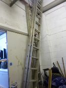 A LARGE ALUMINIUM DOUBLE EXTENDING LADDER, and a similar smaller double extending ladder (2)