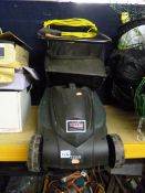 AN ELECTRIC LAWN MOWER