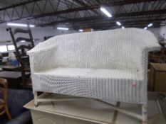 A PAINTED WICKER TWO SEATER BENCH