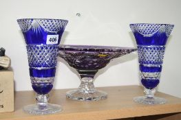 A PAIR OF BLUE FLASHED GLASS VASES, height approximately 22cm and a purple glass tazza (3)