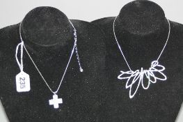 TWO BOXED SWAROVSKI NECKLACES