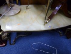 AN ONYX AND BRASS COFFEE TABLE