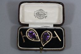 A MODERN PAIR OF AMETHYST CUFFLINKS, stylised pear shape amethyst measuring approximately 16mm x