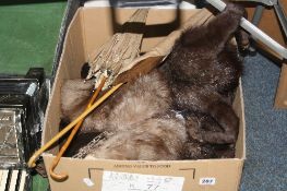 A BOX OF FURS AND PARASOLS, to include stoles, child's cape and glove patterns