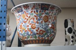 A REPRODUCTION CHINESE POTTERY JARDINIERE