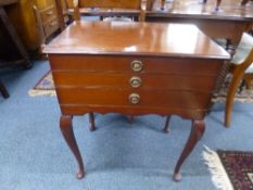 A MAHOGANY THREE DRAWER CANTEEN TABLE, containing a comprehensive assortment of 'Arthur Price'