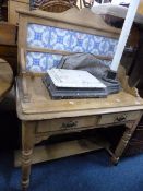 A VICTORIAN PINE TILED BACK WASHSTAND, with two drawers