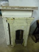 A PAINTED CAST IRON BEDROOM FIREPLACE, and a similar smaller fireplace (no shelf) (2)