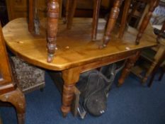 A PINE KITCHEN TABLE, with rounded ends, approximate size length 160cm x width 90cm x height 75cm
