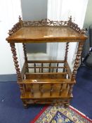 A WALNUT CANTERBURY, the upper section with fretwork three quarter gallery, three divisions with