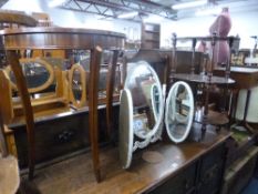 A TRIPLE DRESSING TABLE MIRROR, a mahogany hall table and a mahogany three tier what not/trolley (