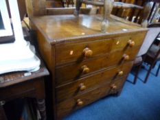 A GEORGIAN CHEST, of two short and three long drawers, with turned wooden handles (replaced) and