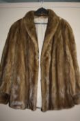 A FUR JACKET, size 14