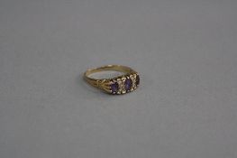 A 9CT AMETHYST AND DIAMOND RING, ring size N