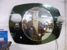 A RETRO WALL MIRROR, with central circular mirror and two wall lights