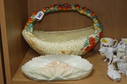 A CLARICE CLIFF FOR NEWPORT POTTERY BASKET, 'Celtic Harvest' design boat shaped with fruit moulded