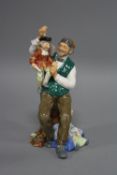 A ROYAL DOULTON FIGURE, 'The Puppetmaker', HN2253