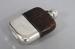 A SILVER CROCODILE SKIN FLASK