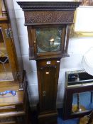 AN OAK CASED GRANDMOTHER CLOCK, eight day movement, unmarked square brass face, approximate size