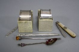 TWO SILVER NAPKIN RINGS, spoons, etc