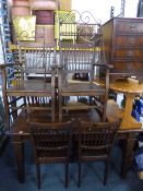 A PINE DINING TABLE, and six chairs including two carvers (7)