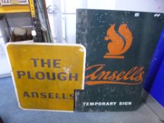 A METAL PUB SIGN, reading 'Ansells, Temporary Sign' and another metal sign reading 'The Plough,