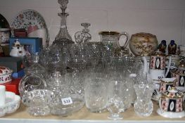 A GROUP OF DRINKING GLASSES, etc, including decanters, champagne bowls, rose bowls etc
