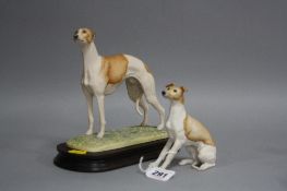 TWO BORDER FINE ARTS WHIPPET FIGURES, seated BO120, style one, by Margaret Turner and standing