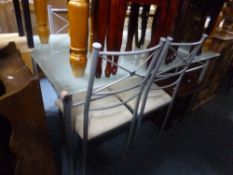 A MODERN GLASS TOPPED TABLE, and four chairs (5)