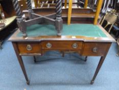A MAHOGANY WRITING TABLE, with raised back, three drawers on square tapering supports, approximate