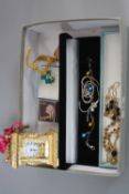 A MIXED LOT, to include a small carriage clock, bracelets and costume jewellery, etc