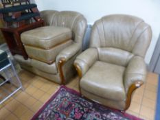 A PALE BROWN LEATHER THREE PIECE SUITE, with wood detail comprising two seater settee, armchair