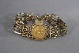 A LATE 20TH CENTURY 9CT GOLD FIVE BAR GATE AND SOVEREIGN BRACELET, George V full sovereign, dated